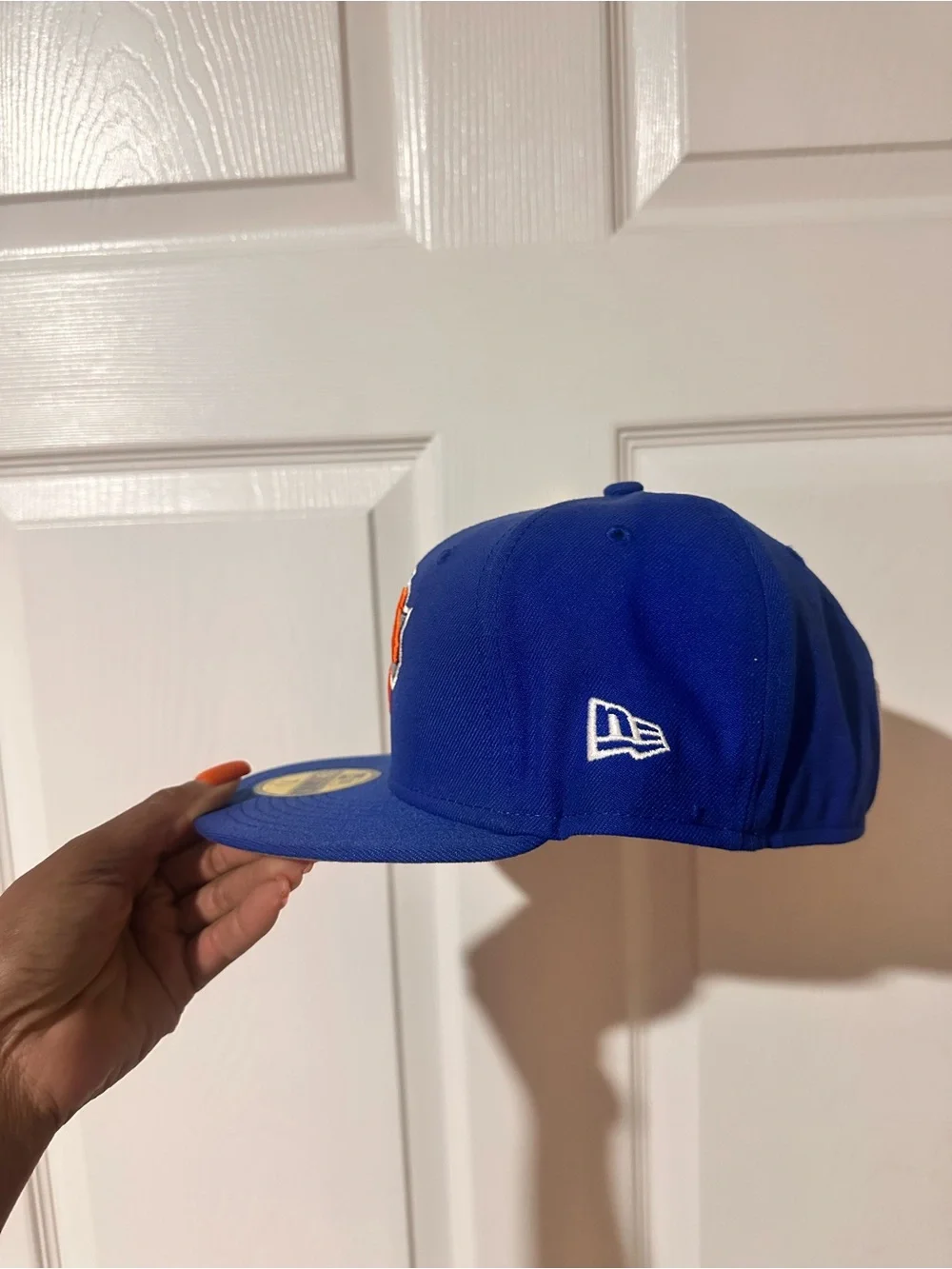 New Era Royal Blue New York Knicks Fitted Hat with Orange Logo